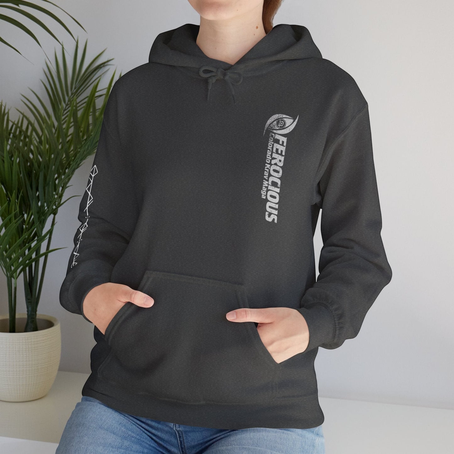 Immortal Krav Maga dark grey 50/50 cotton-poly blend hoodie with "FEROCIOUS Colorado Krav Maga" graphic on chest.